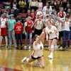 Wasilla’s Lily Hyce reaches out to keep play alive during a win over West Anchorage. Courtesy of Bruce Eggleston/matsusports.net
