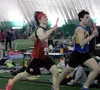 Wasilla's Stephen Hafen tries to catch a Bartlett runner during the Big C Relays.