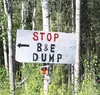 This sign, opposing B&amp;E Sand and Gravel, had been hanging on private property along Pittman Road. HEATHER A. RESZ/Frontiersman