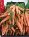 Carrots like these from Vitali and Monica Seldovitsch's family farm in the Butte are still available at the Mat-Su Farm Market open Mondays from 11 a.m. to 7 p.m. in the Palmer Depot. CAITLIN