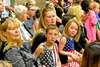 Family members watch a farewell ceremony September 7 at the Fort William Henry Harrison Reserve Center gymnasium in Helena, Montana. The 652nd RSG will become the first U.S. Army Reserve unit