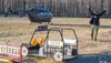 DEA Group Supervisor Shane Pitts exits the ANG's UH-72 Lakota at Meadow Lakes Elementary School. J. David McChesney/Frontiersman