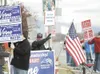 Wasilla Mayor Verne Rupright waves to traffic at the corner of
the Parks Highway and Main Street in Wasilla Tuesday afternoon.
(ROBERT DeBERRY/Frontiersman)