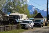 Multiple agencies served an arrest warrant and search warrant in a Palmer neighborhood Tuesday. Tim Rockey/Frontiersman