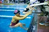 Raina Lewis of Wasilla High School during the beginning of the 100 backstroke race at the Colony Invite on Saturday. Gretchen Snelders went on to win the event with a time of 1:08.65. KATIE S