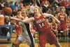 Wasilla’s Kellie Lindman and Soldotna’s Skylar Shaw scramble after a rebound during Wasilla’s win Saturday in the third-place game of the Northern Lights Conference Championships at Colony Hi