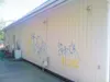 JANICE SHIPMAN/Courtesy photo Grafitti stands out against the
white walls at the Mat-Su Early Development Academy in Wasilla.
Police are looking for two boys who they say are behind a rash of