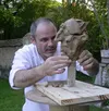 Russian-born sculptor Simon Kogan, who has lived in Washington state for the last 25 years, works on a clay portrait. Kogan will be the featured artist at the Machetanz Arts Festival at Mat-S