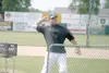JEREMIAH BARTZ/Frontiersman Mat-Su Miners head coach Russell
Raley throws batting practice. After leading the Miners to their
second straight Alaska Baseball League title, Raley was named the