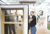 ROBERT DeBERRY/Frontiersman Spenard Builders Supply’s Keith
Furlong talks windows Saturday at the 30th annual Home Builders
Home Show at the Curtis D. Menard Memorial Sports Center in
Wasilla
