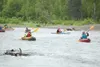 Participants in the fourth annual Little-Su Float Classic put on
by Wasilla Rotary paddle their way along the 16.9-mile course. This
year's race put an emphasis on cleaning up the Little-Su w