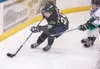 Former Alaska Avalanche forward Matt Friese takes control of the
puck during a's game against the Fresno Monsters. Friese has
commited to play hockey at Division I University of Alaska
Fairba