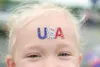 Jaylynn Gangstad, 4, shows her Fourth of July spirit. ROBERT
DeBERRY/Frontiersman