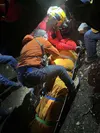 Emergency personnel work to rescue Jeremy Johansen. Photo courtesy of Trooper Tyler Bosdell