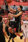 Colony senior Anton Chamblee goes to the basket during an 80-72 loss to the Coronado Cougars of Henderson, Nevada, during the first day of Doc Larson's Roundball Classic, Dec. 17 at Wasilla H