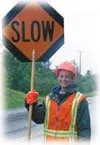 Brittney James directs traffic on the Palmer Wasilla Highway
during the construction season. Photo by NAOMI
KLOUDA/Frontiersman.