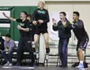 Colony wrestlers (L-R) Caleb Hopkins, Chace Booth, Eric Christy and Jordan Nero cheer after teammate Klancey Doyle pinned Bethel's Bryan Malvich on Thursday during the Colony Duals at Colony 