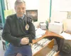 ROBERT DeBERRY/Frontiersman Trooper Rick Pyles sits on his desk
next to two full file drawers of more than 2,100 open warrant
cases. Pyles’ coverage area spans from Glennallen in the east to
