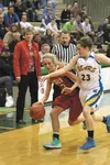 Wasilla junior Machia Toews tries to drive past the reach of Kodiak’s Carissa Canon during a loss to the Bears Friday at Colony High. Courtesy of Bruce Eggleston/MatSuSports.net