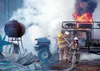 Palmer Assistant Fire Chief Barry Mothershead, right, pulls hose
for firefighter Darrel Schurman as they try to contain a fire
burning the inside Stan Roach's Ford pick-up. Photo by WILLIAM
W