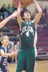 Colony Middle School’s Larkin Udomporn pulls up for a shot
during the Valley Basketball Championships at Teeland Middle School
on Saturday. (ROBERT DEBERRY/Frontiersman)
