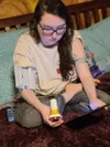 Kathlyn Chassey uses a home health care kit as part of the COVID-19 Remote Monitoring Program, a joint effort of the Virtual Medical Center and Brooke Army Medical Center, in San Antonio, Dec