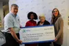 MTA CEO Michael Burke [left], Mat-Su Senior Services CEO Brandi Burchett [middle left], Mat-Su Senior Services Board President Linda Combs [middle right], and MTA COO Wanda Tankersley pose fo