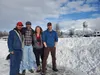 Michael B. Dillon (left), Berick Cook (middle left), Chery Manning (middle right), and Dean Q. Mitchell (right) gather in downtown Palmer for a reunion photo. Jacob Mann/Frontiersman