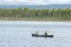 ROBERT DeBERRY/Frontiersman Noah Asay, left, Ethan Anderson,
center, and August Asay paddle their way across Kelly Lake in
Willow Sunday afternoon.