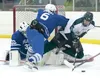 Palmer junior forward Luke Wright knocks Colony’s Jonathon Boyer out from in front of the net during the second period of Thursday’s quarterfinal game at the North Star Conference Hockey Cham