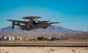A U.S Navy E-2D Advanced Hawkeye aircraft takes-off during a U.S. Air Force Weapons School (USAFWS) Integration exercise at Nellis Air Force Base, Nevada, Nov. 19, 2020. The USAFWS teaches gr