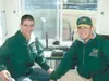 Photo submitted by the Mat-Su Miners Syracuse University
students Jonathon Erwin, left, and Andrew Africk sit in the press
box at Hermon Brothers Field. The pair have spent the summer as the
