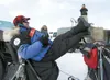 ROBERT DeBERRY/Frontiersman Big Lake musher Martin Buser puts
his feet up and takes a rest before the start of the 2010 Iditarod
Trail Sled Dog Race in Willow on Sunday.