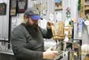 August Naranjo pours a beer inside the Bleeding Heart Brewery taproom Friday. Tim Rockey/Frontiersman