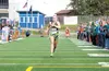 Colony’s Audrey Michaelson runs to a second-place finish during the 5K Palmer Invitational Saturday at Palmer High School. ROBERT DeBERRY/Frontiersman.com