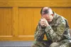 U.S. Army Lt. Col. Kevin Daul, 673d Air Base Wing deputy installation chaplain, prays during a service honoring the Four Chaplains at the Arctic Warrior Chapel on Joint Base Elmendorf-Richard