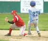 JEREMIAH BARTZ/Frontiersman Palmer senior Justin Ratcliff, left,
hits second base before Wasilla infielder Corey Cowgill is able to
turn and attempt the tag during the Warriors’ 13-7 win over