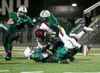 The Colony Knights stop a Dimond Lynx push for yardage during Friday’s game at Colony High School. ROBERT DeBERRY/Frontiersman.com
