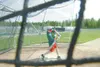 ROBERT DeBERRY/Frontiersman Mat-Su Miner Pat Minogue practices
batting Monday during the Miners practice at Hermon Brothers Field
in Palmer.