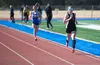Wasilla High School senior Allison VanPelt leads Palmer’s Sophie Wright as she nears the finish line in the girls 800 meter final at the Region III Preview at Soldotna High School on Saturday
