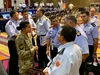 First Lt. Lorrayne Kealty, 14th Air Support Operations Squadron, Pope Army Airfield, N.C., speaks with Central and South American air force leaders at the Conference of American Air Chiefs in