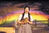 Katy Schmidt as Dorothy in "The Wizard of Oz' performs 'Somewhere over the Rainbow' during practice Wednesday evening at the Valley Performing Arts Center in Wasilla. Robert DeBerry
