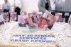 Mat-Su Senior Services Grand Opening Wednesday included a pair
of cakes topped with photos of the familiar faces at the new senior
center (HEATHER A. RESZ/Frontiersman)