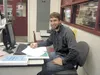 Houston High’s biomedical teacher Colton Conner grades students’ career journals. HOLLY BRETT/For Frontiersman.com