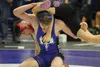 Palmer's Sidney Watchus lifts Colony's Kade Torres off the mat during the 132-pound match of a dual Tuesday at Palmer. Watchus scored a 7-2 victory over Torres in the match, but the Knights c