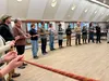 Amanda Montavon closed the meeting with a circle of trust. The moment, symbolic of what is possible. Russell Clark/For the Frontiersman