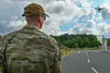 Senior Airman Ryan Hospelhorn, 52nd Security Forces Squadron small unmanned aircraft systems program manager, pilots a simulated foreign drone during a Paladin drone overview assessment, July
