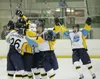 (ROBERT DeBERRY/Frontiersman) Tha Alaska Avalanche celebrate
after tieing up the score in the last 40 seconds of play Friday
during first round play off action at the Curtis C Menard II
Memor
