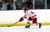 Wasilla's Dylan Mead pulls the puck off the boards during a 2-1 loss to North Pole. Bruce Eggleston/matsusports.net
