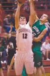 ROBERT DeBERRY/Frontiersman Wasilla junior Braydon Kuiper
extends with the ball against Colony defender Hunter
Eisenhower.